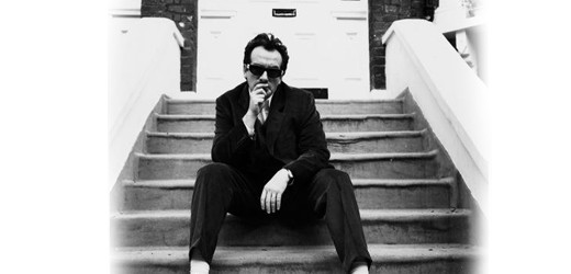 Elvis Costello mit seiner Band The Imposters im Juli auf Tour